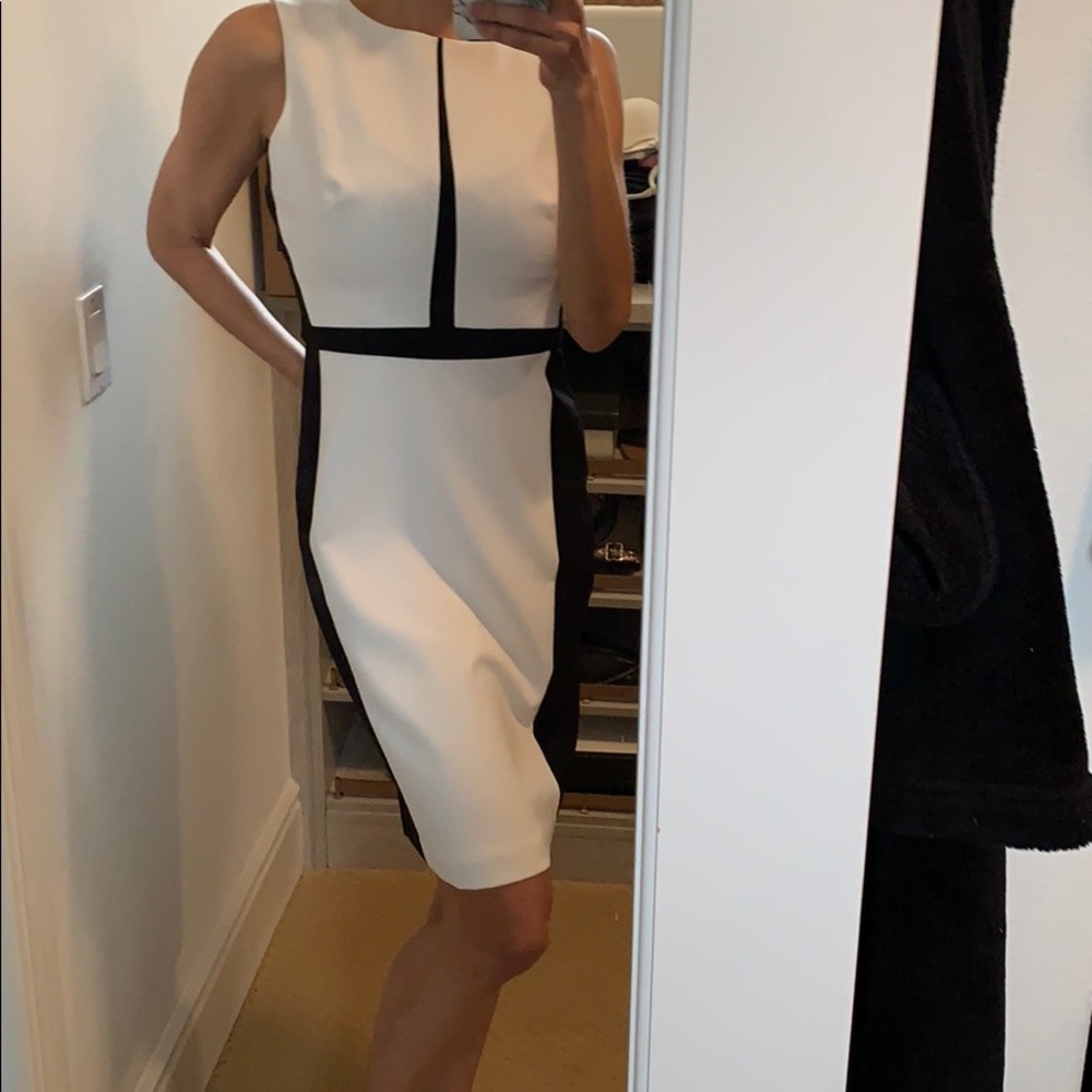 Size 4 dress never worn because I am a 0